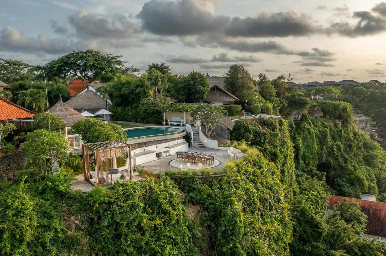 The clifftop estate amid tropical greenery